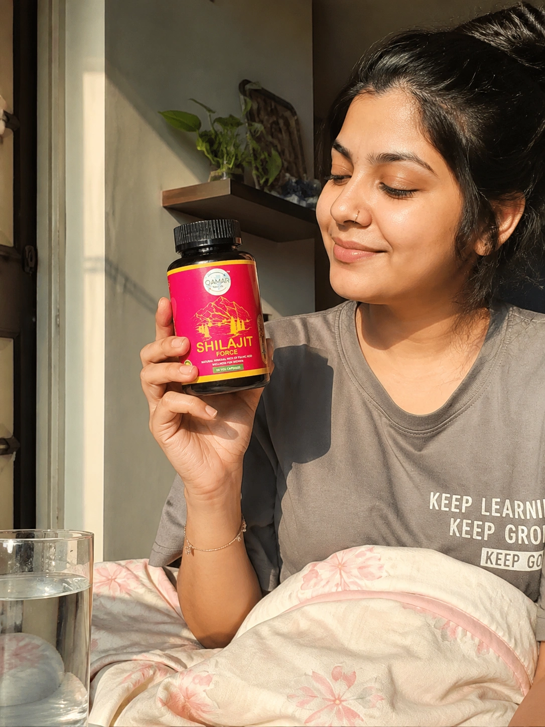 Customer holding Qamar Naturals Shilajit Resin
